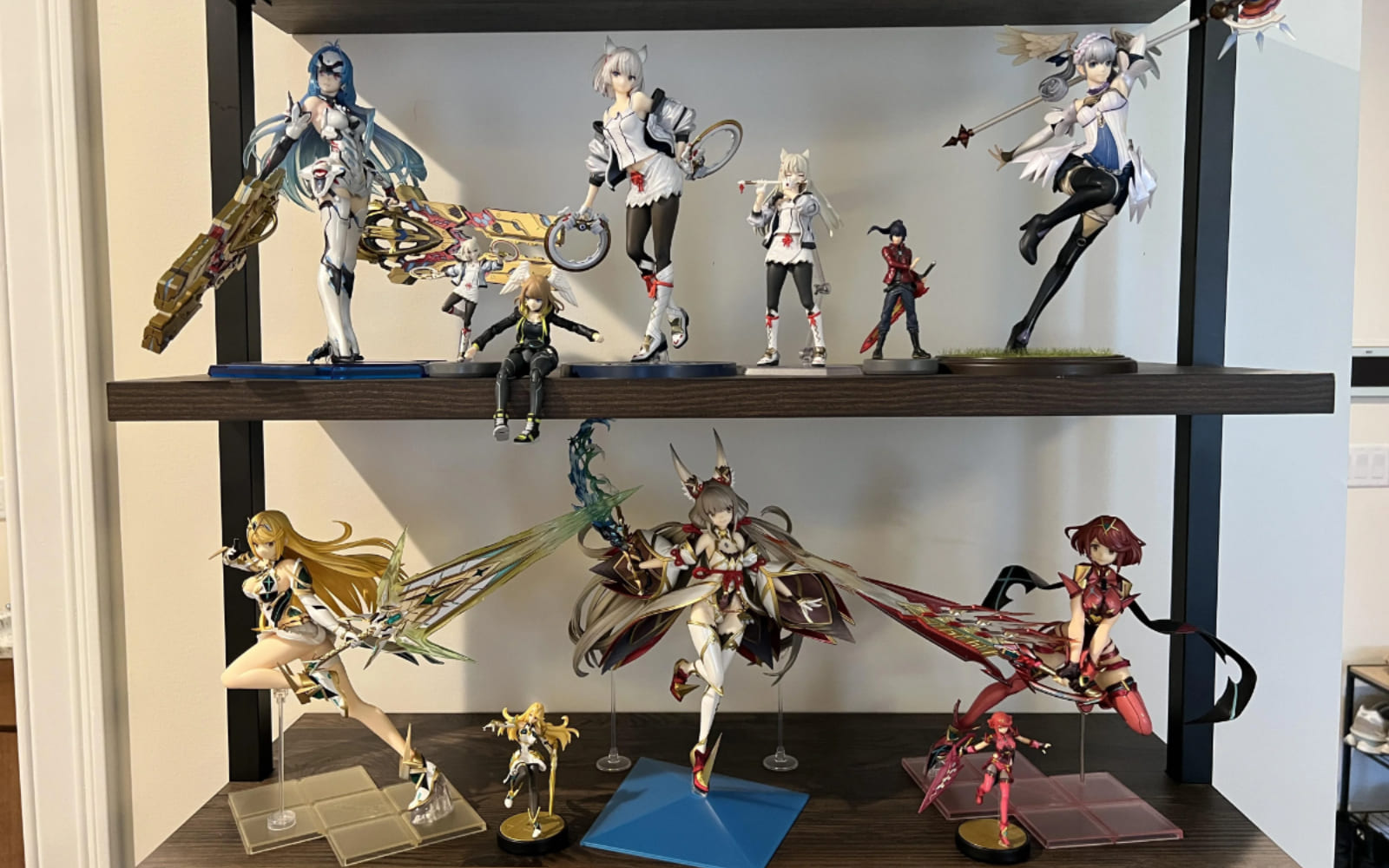Anime figures and collectibles displayed at Legendary Vault